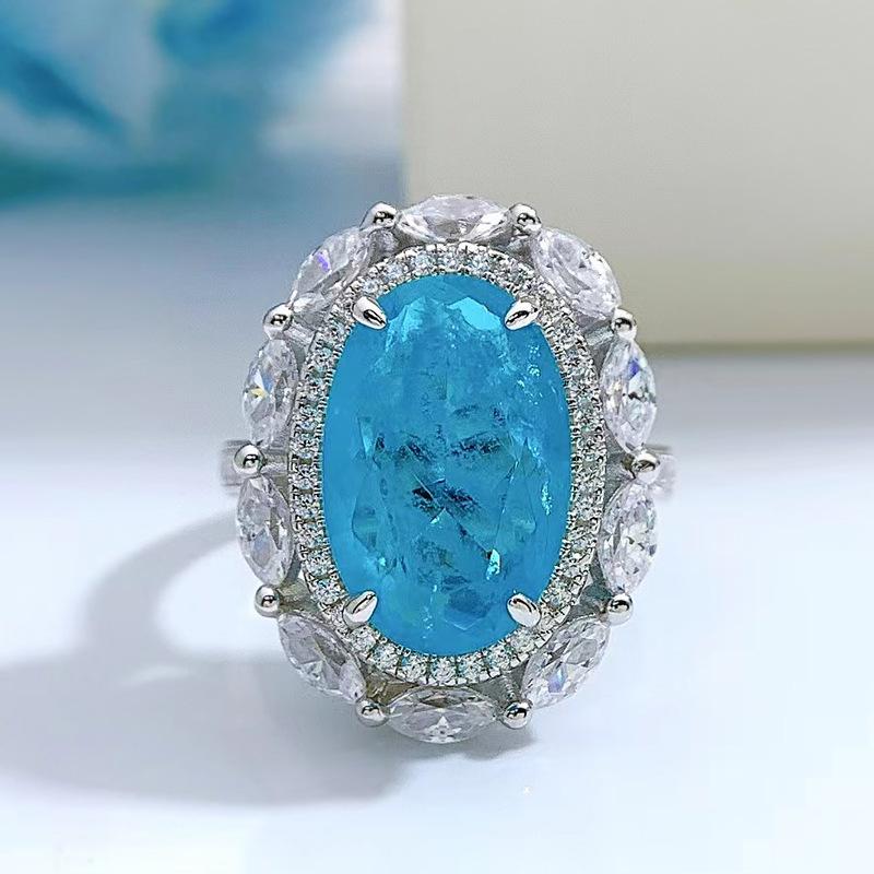 

Hui Zhi Yi 2023 Synthetic Paraiba S925 Sterling Silver Women s Ring, 10x15mm European & American Fashion. Size 5