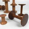 Retro Solid Wood Spool: Nostalgic Handmade Thread Organizer for Cross-Stitch and Crafting.