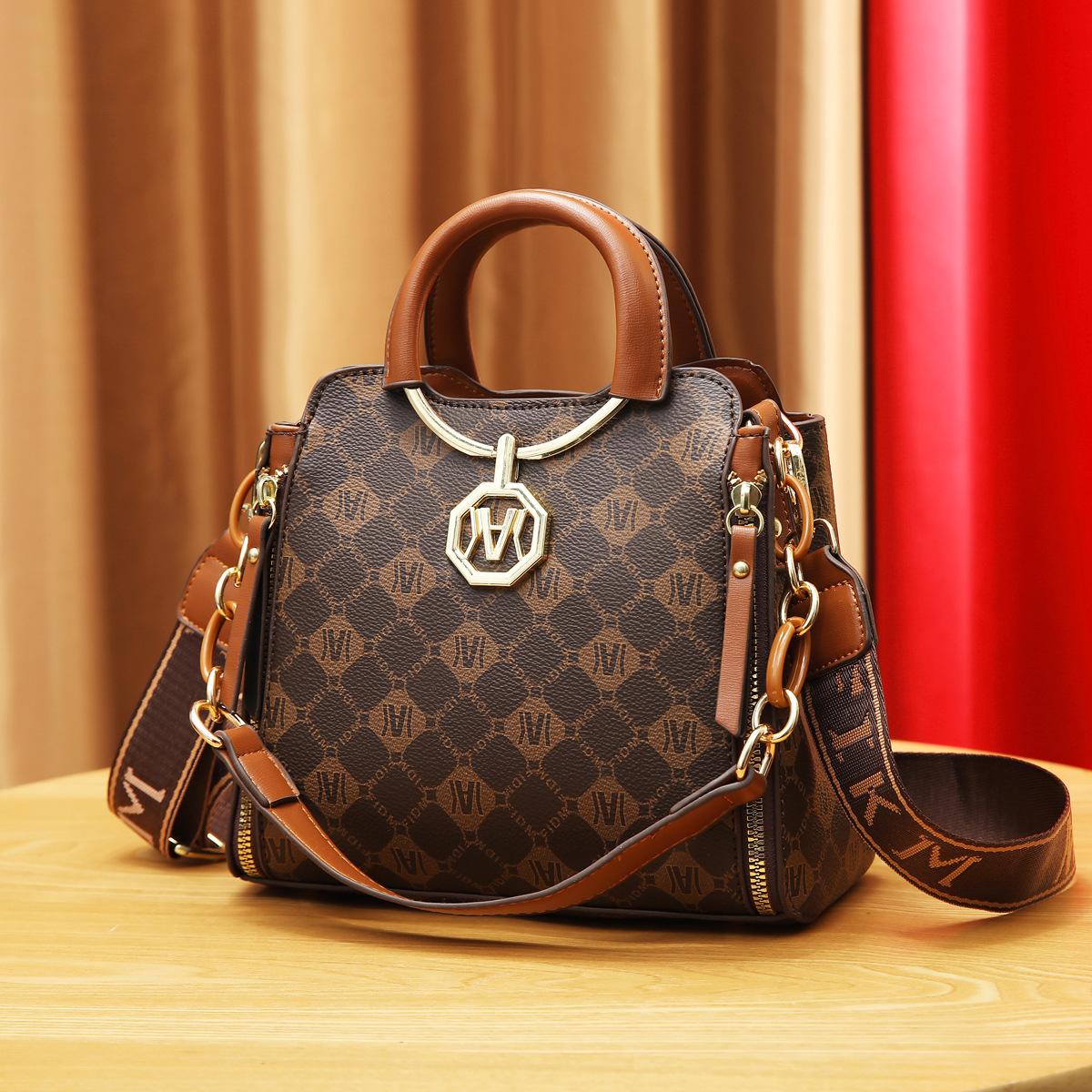 

Хит продаж сумки Сумки-ведра женские 2025 новые большой вместимости высококлассные нишевые универсальные сумки через плечо женские сумки