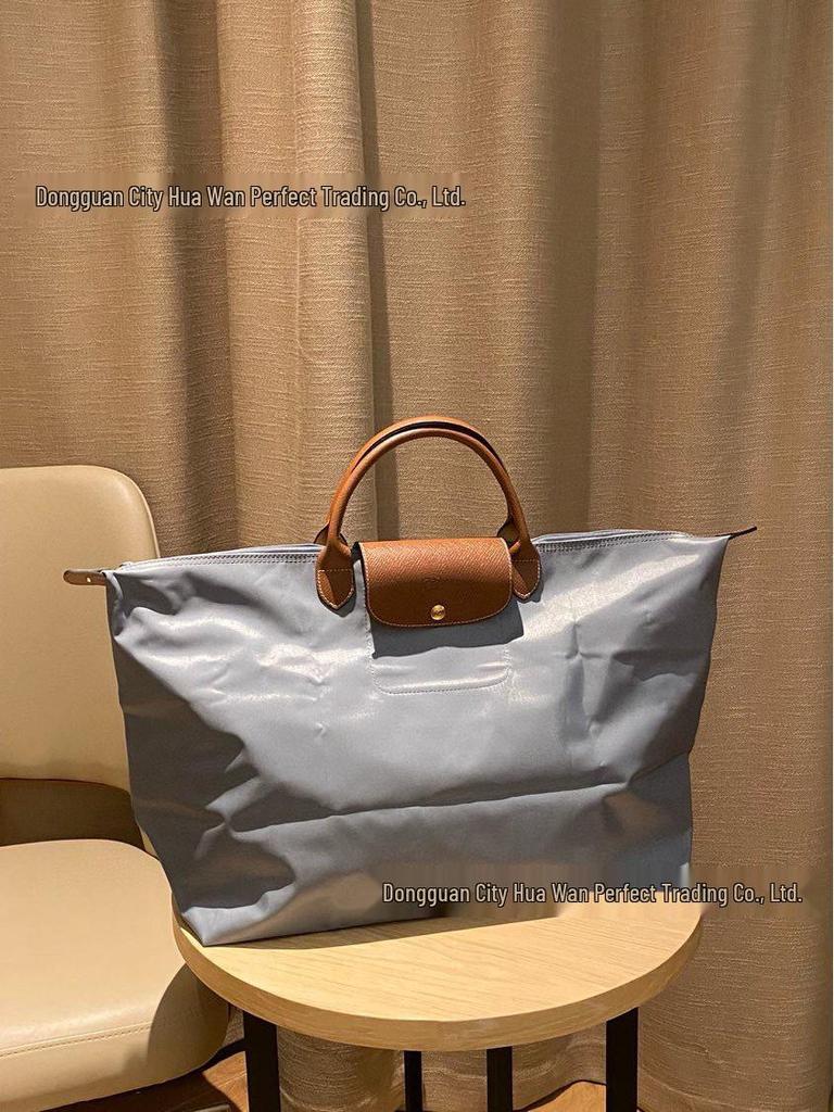 Xiangjia Large-Capacity Waterproof Oxford Travel Tote Bag, Lightweight and Foldable.