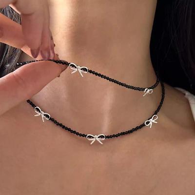 Imitationsperlen Kristallperlen Halskette Elegantes Schleifen-Charm Choker Mädchen Halskette Damen Party Schmuck Geschenke Kragen