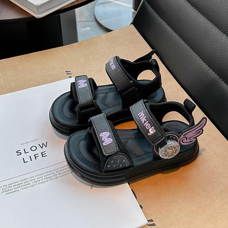 

Girls wings rotating button sandals spring and summer 2025 new children s hollow beach shoes fashion open-toed shoes 26