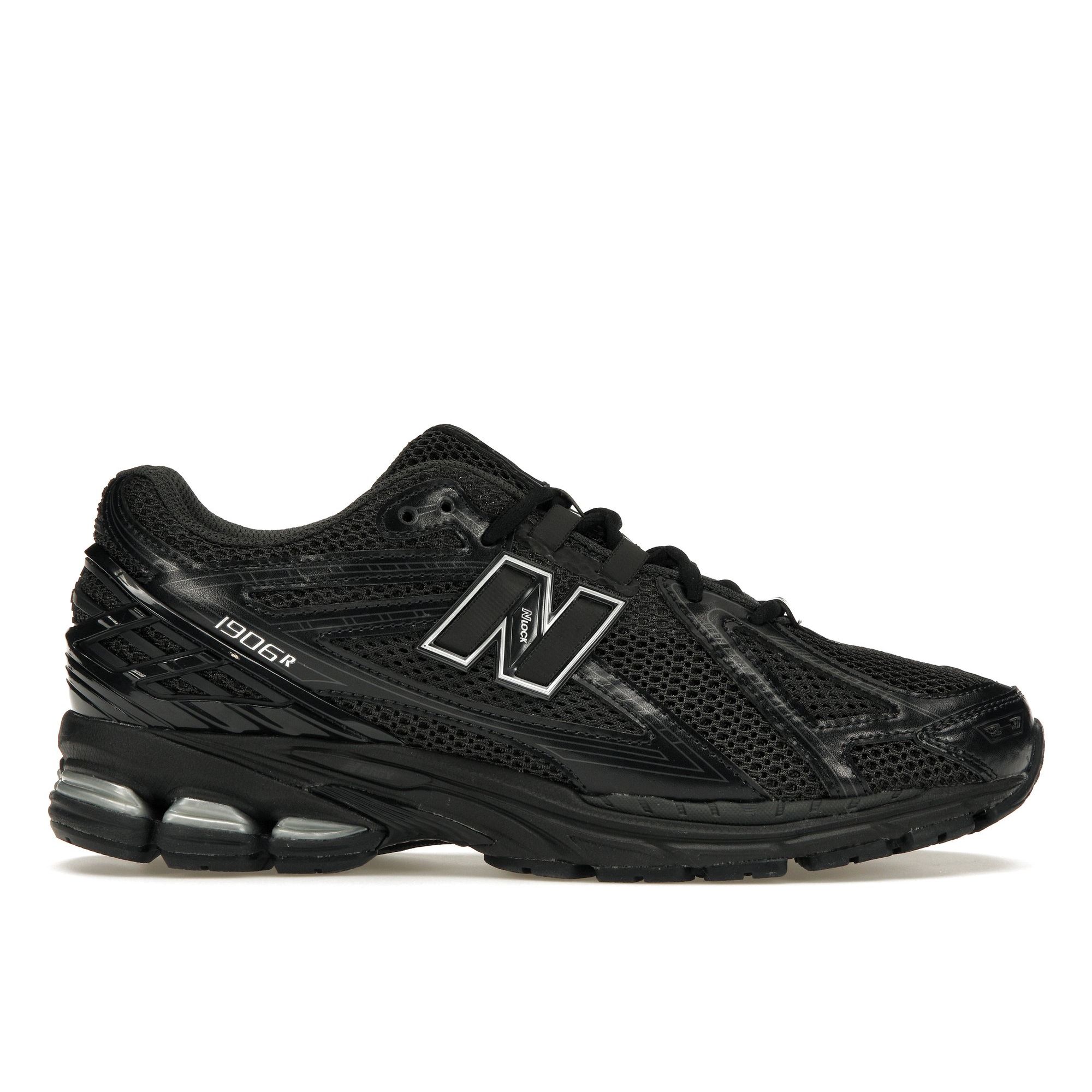 

Кроссовки унисекс New Balance 1906R черные металлик серебристого цвета M1906RJB 36