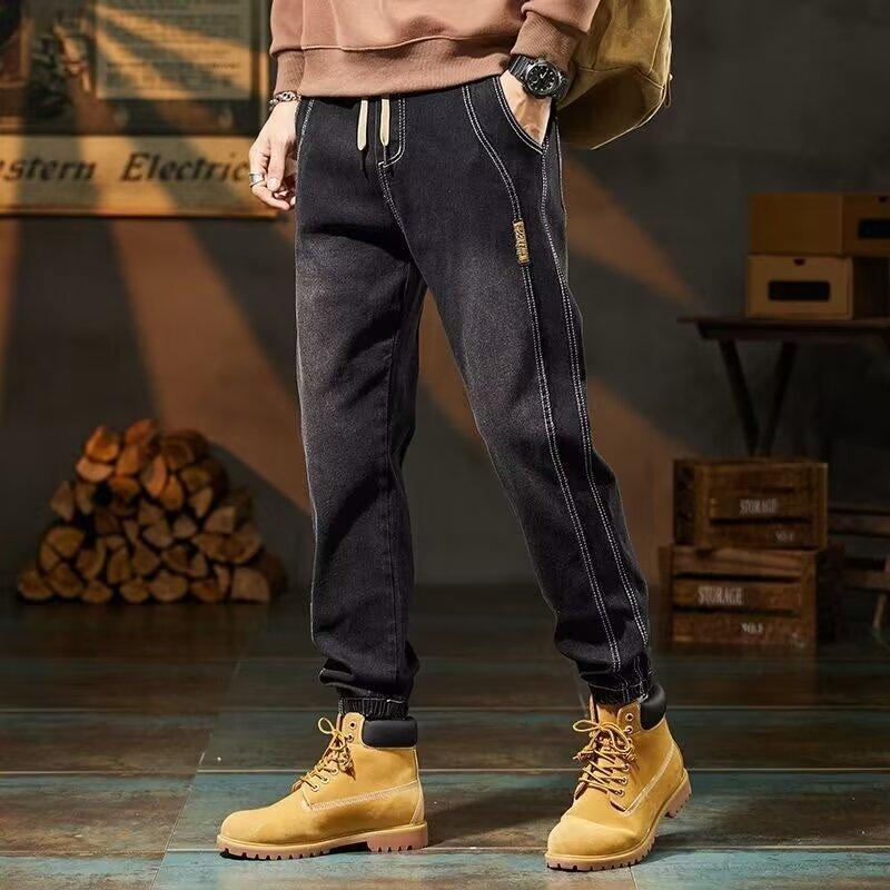

New jeans men s loose elastic versatile autumn and winter tied feet casual pants men s wear-resistant washing 3XL