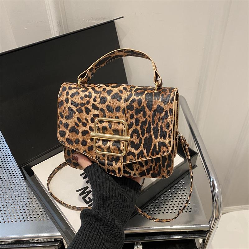 

Милый и крутой стиль леопардовый принт сумка Spice Girl женская 2025 новый нишевый дизайн сумка-багет высококлассная сумка на плечо сумка подмышку коричневый
