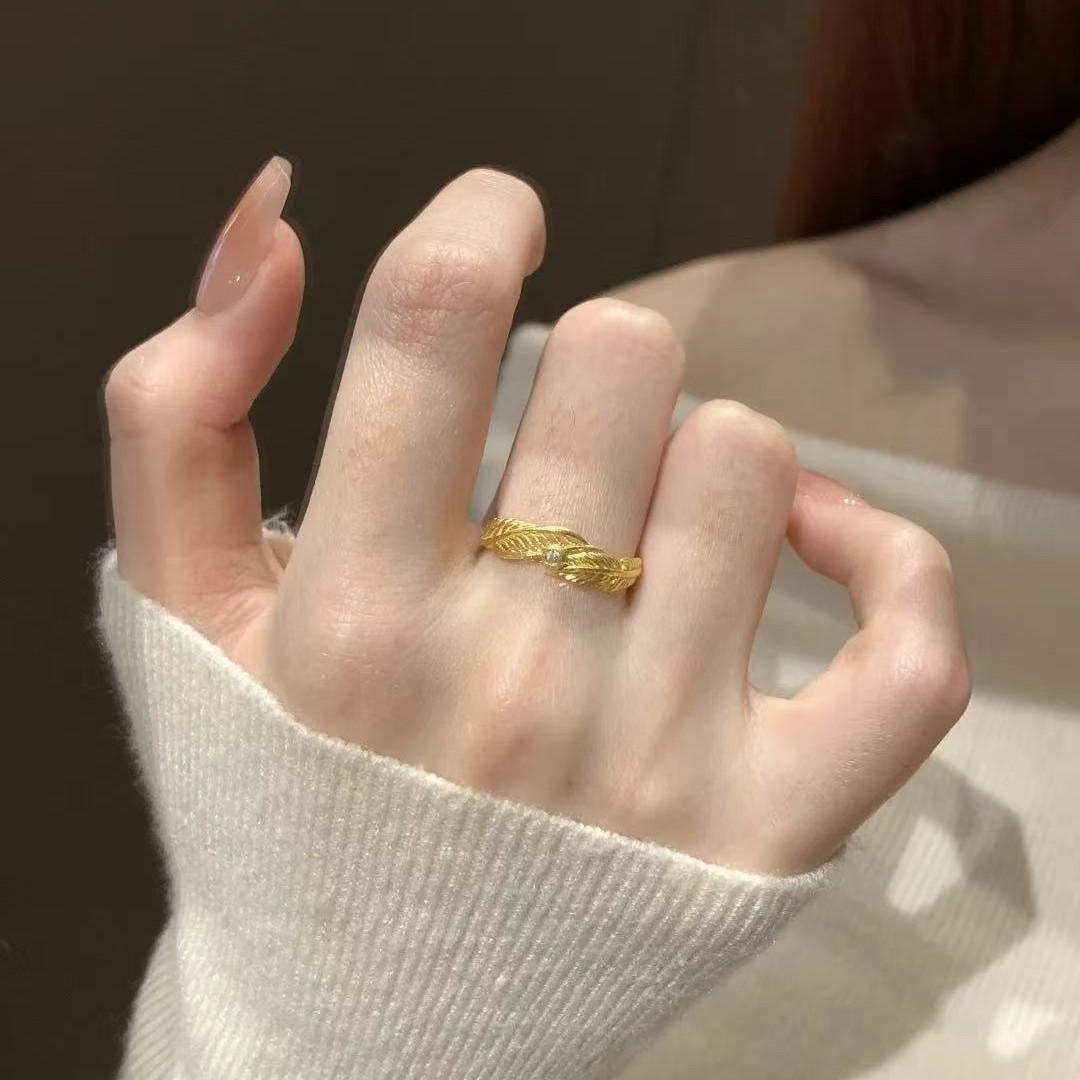 

Xiaohongshu Angel Wing Ring: Double-Sided Hollow Feather Texture for a High-End Feel