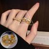 Elegant French Court-Style Index Ring for Women - Hollow Design, Luxurious, Adjustable, High-Quality Texture, Fashionable.