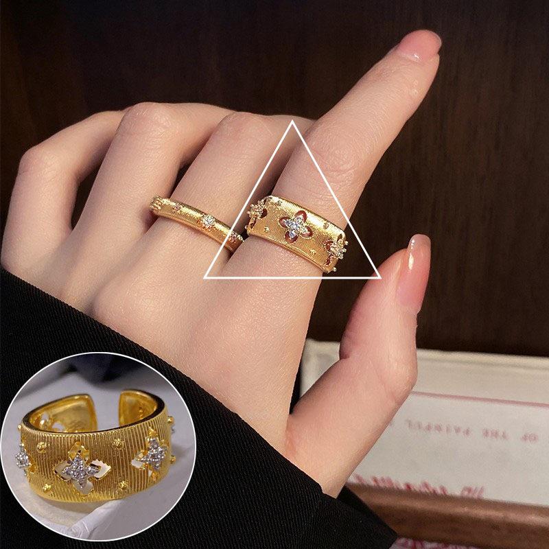 Elegant French Court-Style Index Ring for Women - Hollow Design, Luxurious, Adjustable, High-Quality Texture, Fashionable.