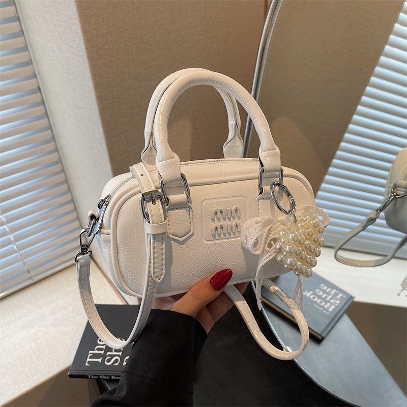 Niche casual messenger bag new fashion shoulder bag feeling hand carry bowling women's bag handbag bag