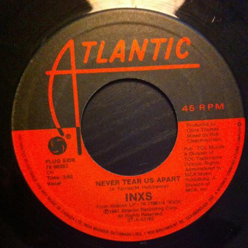 

7inch Record INXS Never Tear Us Apart 7890387 Atlantic 1988 Canada Rock Used
