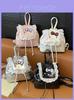 Mochila Infantil Hello Kitty com Acabamento em Renda e Estampa de Desenho Animado Para Uso Diário