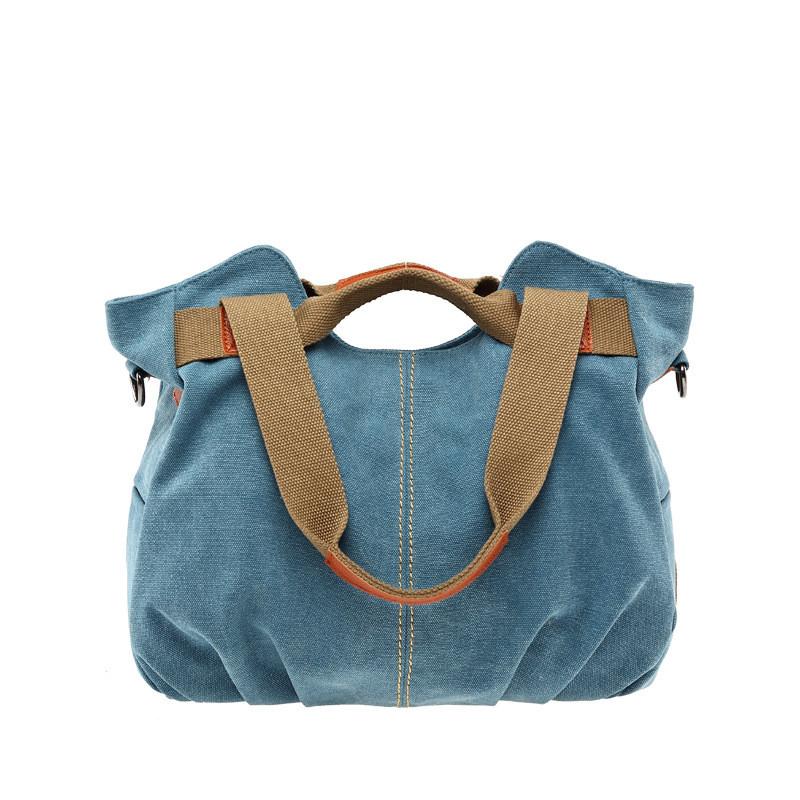 Borsa a tracolla in tela a forma di conchiglia con tasche con cerniera per donne casual