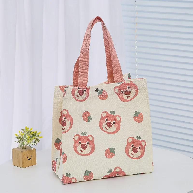 2023 Summer Cartoon Canvas Handbag for Women: Small, Simple, and Perfect As a Lunch or Student Bag.