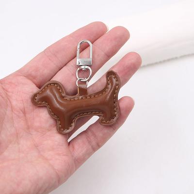 מחזיקי מפתחות דוקסונד לנשים תליון קולב מעור PU קישוט לתליון תיק מחזיק מפתחות לרכב אביזרים מתנות