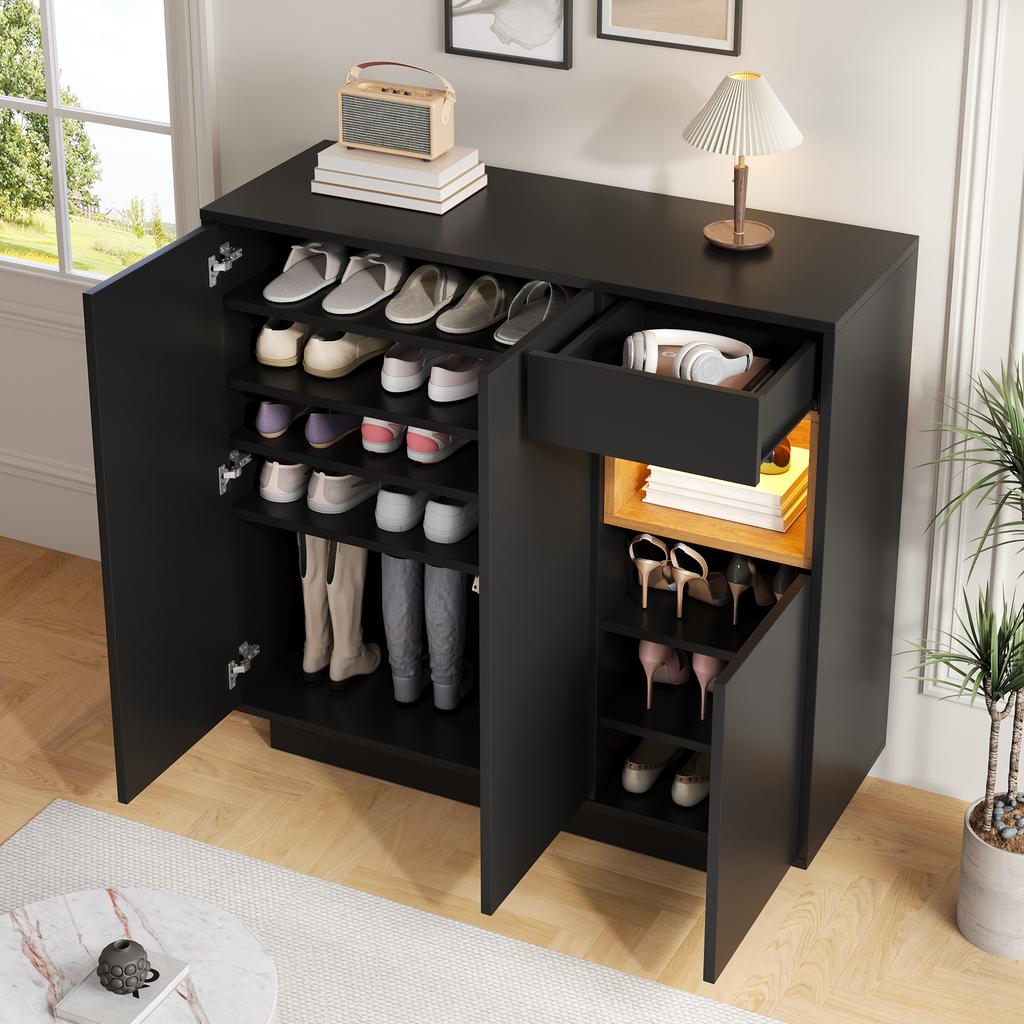 Shoe Cabinet with One Drawer and Adjustable Shelves In Black and Wood Is Perfect for Modern Hallways. It Offers Space for 14–18 Pairs of Shoes.