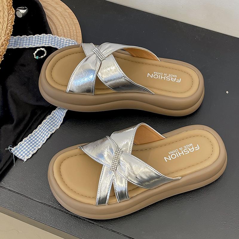

French thick-bottomed cool slippers for women s summer outer wear 2025 new cross-strapped flat-bottomed high-end skirt one-word slippers 35