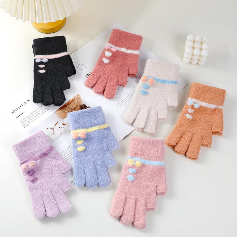 Wool gloves show two fingers, women keep warm in winter, knit for cold protection, draw and write, students play with mobile phones with two fingers