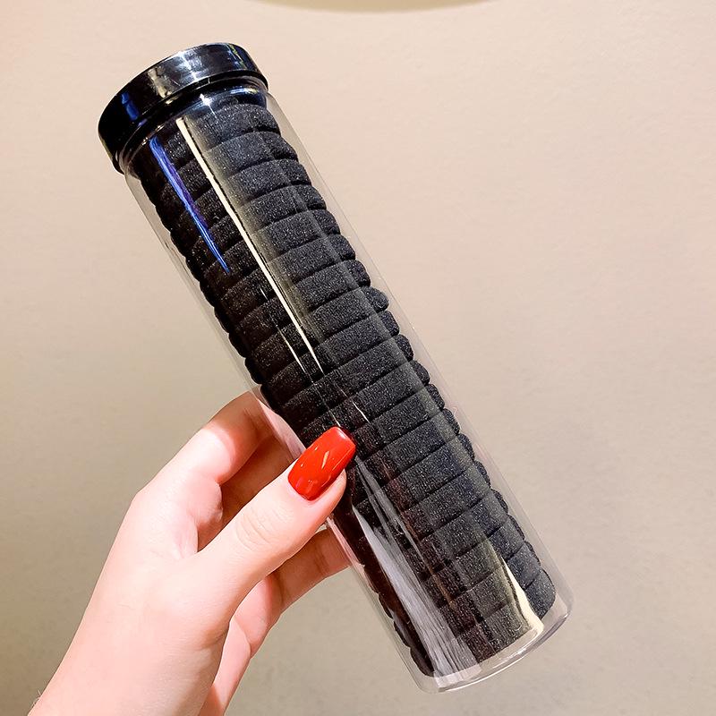 Seamless Black Rubber Hair Tie for Women - High Elasticity, Durable, and Hair-Friendly Hair Accessory.