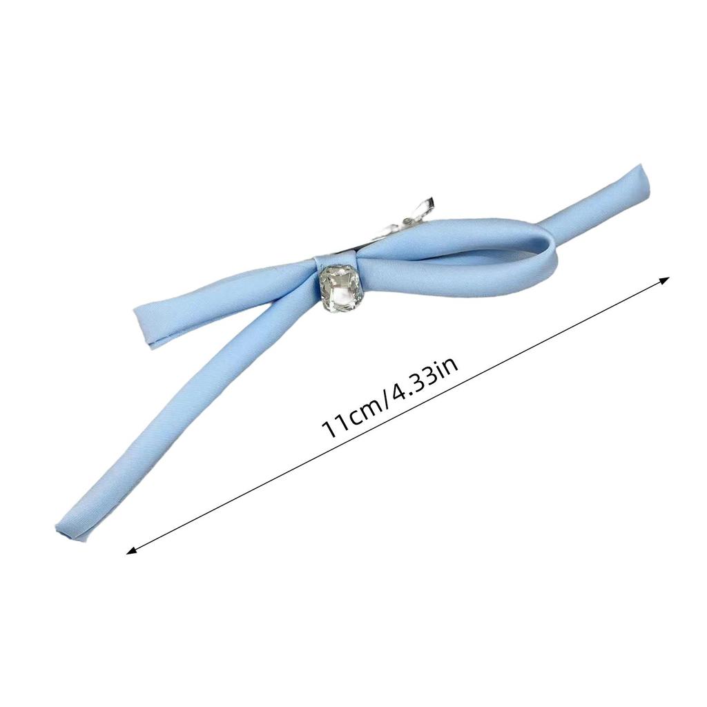 Søt hårklemme med sidesveis, sløyfehårbøyle, fasjonable hodeplagg, avslappet hodebekledning, holder hårstråene sikkert
