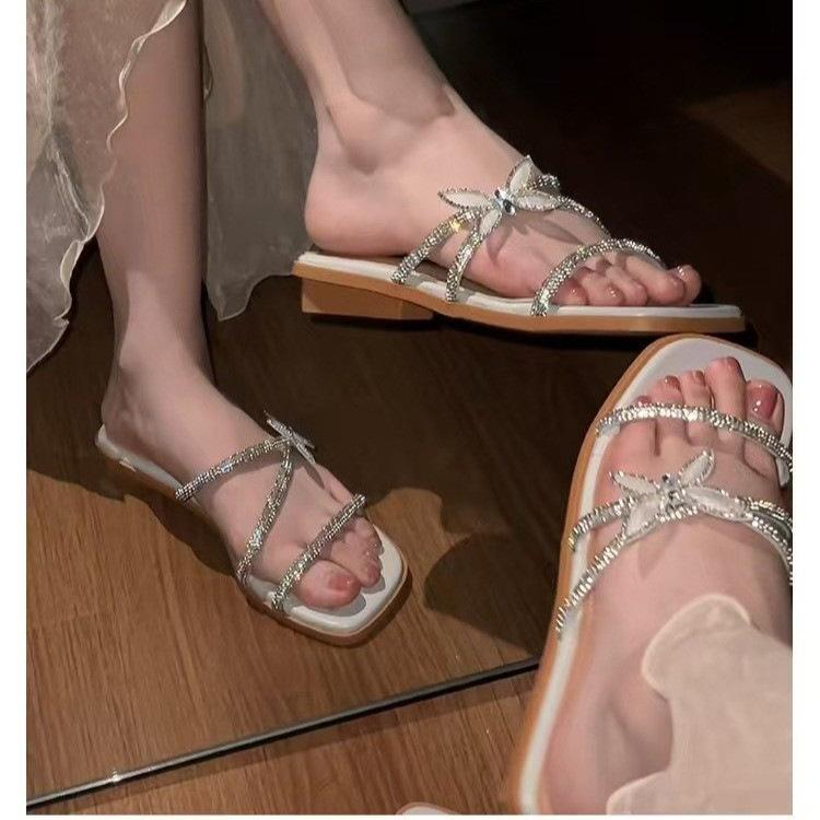 

Fairy wind open-toed sexy high-heeled outer slippers 2025 summer new thin-heeled butterfly rhinestone word with sandals woman 35 бежевый
