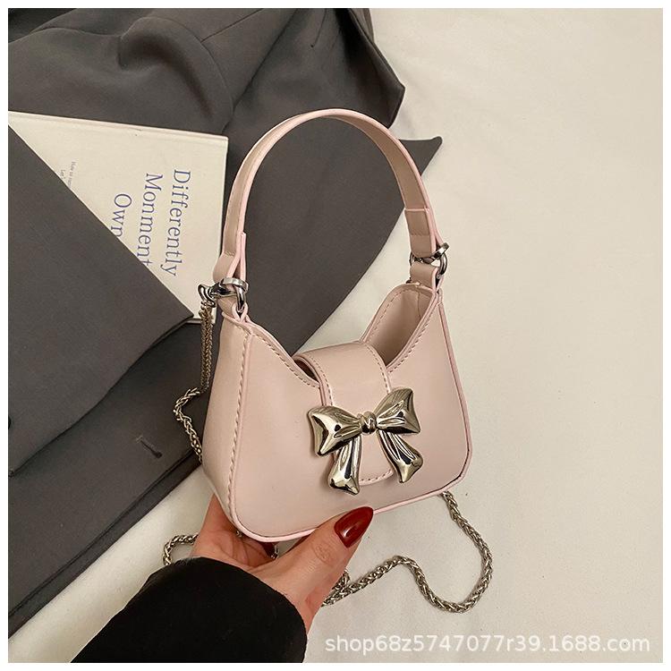 Foreign style mini small bag women 2025 new Korean version versatile bow portable shoulder crossbody small bag mouth red envelope