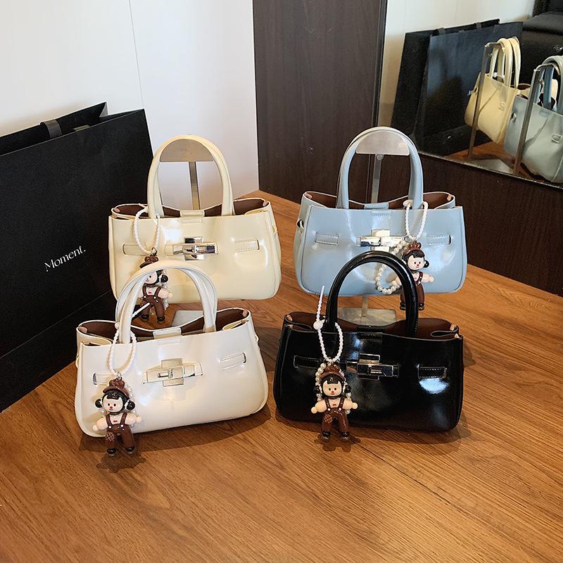 Mode Nische tragbare kleine quadratische Tasche neue einfache und schöne Schultertasche Textur trendige Umhängetasche