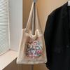 Popular large-capacity woven tote bag women's new commuter seaside vacation style shoulder armpit bag