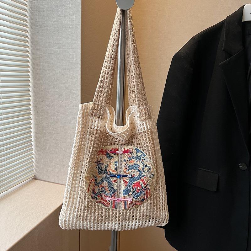 Popular large-capacity woven tote bag women's new commuter seaside vacation style shoulder armpit bag