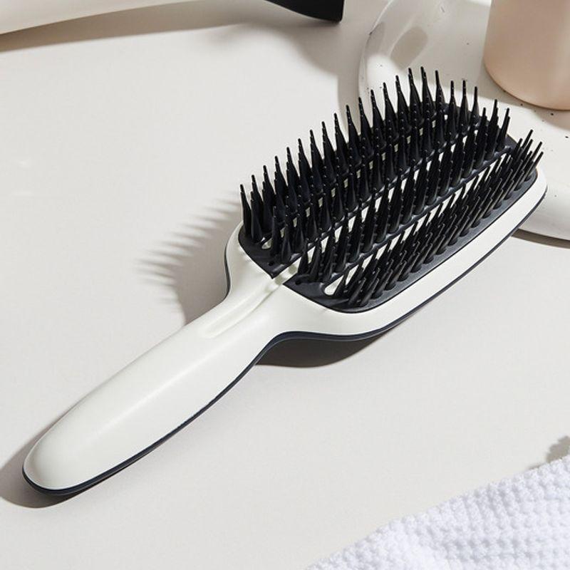 

Tangle Teezer Инструмент для сглаживания Половина