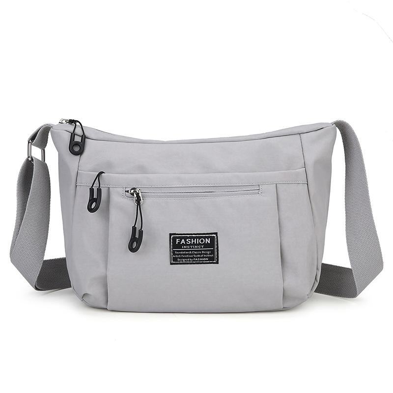 

2025 Новая Мода Сумка-мессенджер Большая Вместимость Нейлоновая Холщовая Сумка Через Плечо Многоотделенческая Легкая Простая Сумка Кроссбоди серый