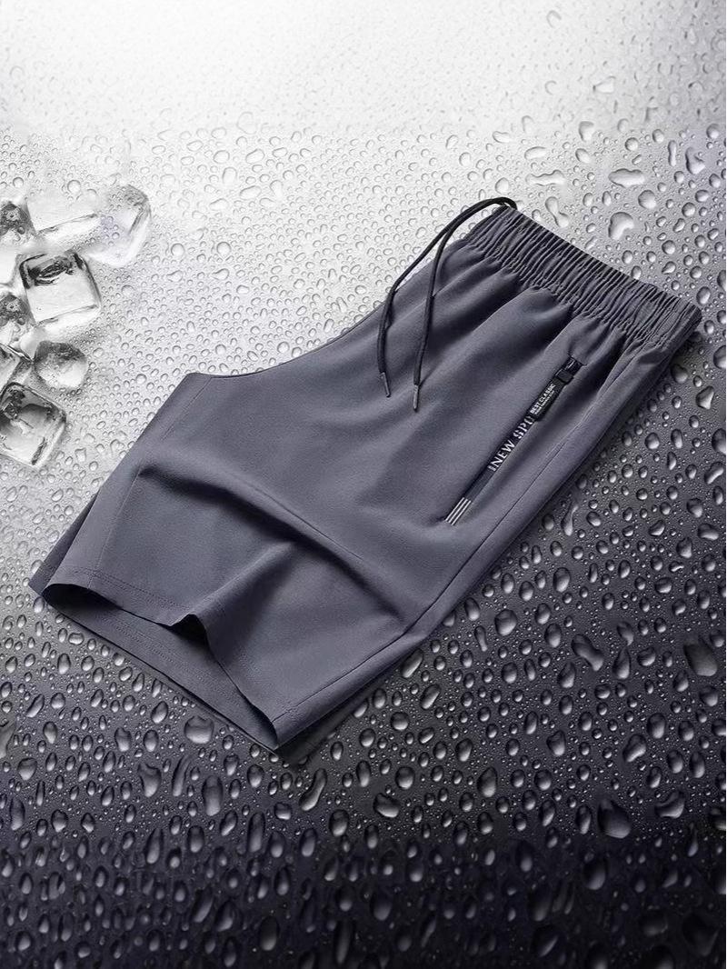 

Мужские летние быстросохнущие шорты из ледяного шелка - Европейско-американский стиль, свободный крой, большие размеры, с коротким рукавом, легкие. 3XL серый