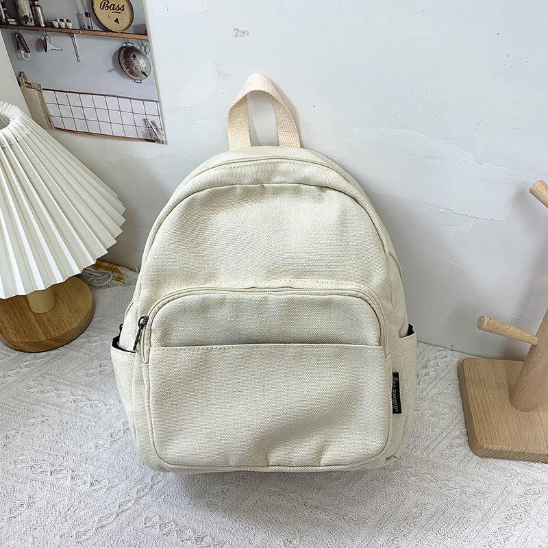 

Japanese ins canvas college student small schoolbag female versatile Mori student backpack vintage solid color small backpack