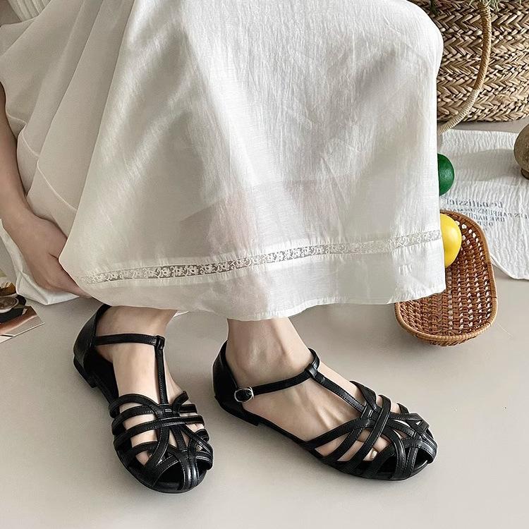 French summer new hollowed-out one-word strap Roman shoes flat-bottomed bag head sandals women's Mori women's niche design hollow