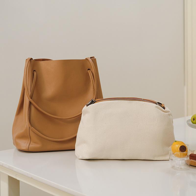 Moale Cowhdie Minimalism Geantă de mână pentru femei Geantă cu găleată Elegantă în stil franțuzesc Geantă mare de tote pentru damă Geantă de lux din piele naturală de marca de designer