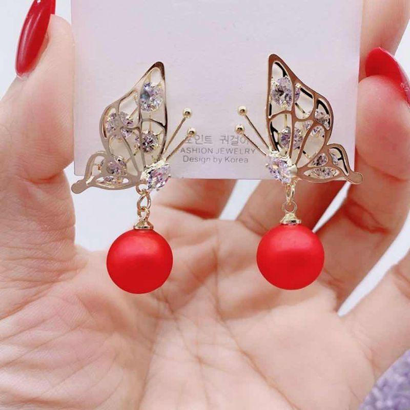 Fashion Geometric Bow Flower Pearl Earrings Women'S Premium Versatile Small Fragrant Wind Earrings