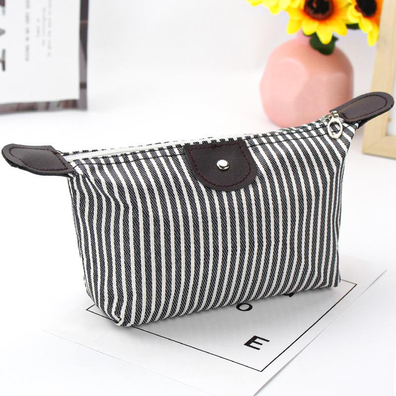 

Korean Style Striped Dumpling Makeup Bag: Foldable, Waterproof Toiletry Bag for Travel and Bath.
