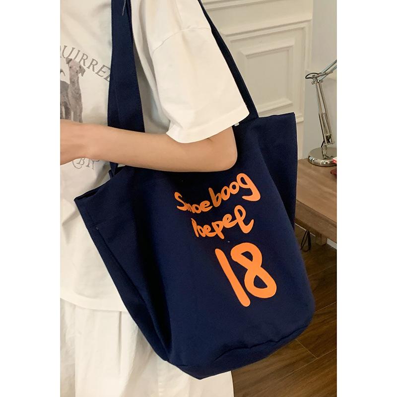 

Повседневная сумка-тоут в стиле колледжа, женская, новая 2025, холщовая сумка с алфавитом, универсальная, большой вместимости, на плечо, подмышку темно-синий