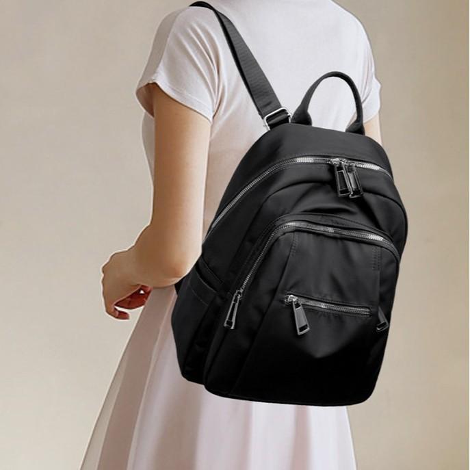 Schoolbag Oxford cloth women's backpack 1011 new versatile simple durable backpack commuting large capacity travel schoolbag women