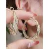 Wunderschöne verschlungene goldfarbene Creolen mit filigranem Netzmuster, stilvolle Ohrringe für Frauen, Partygeschenk, Schmuck