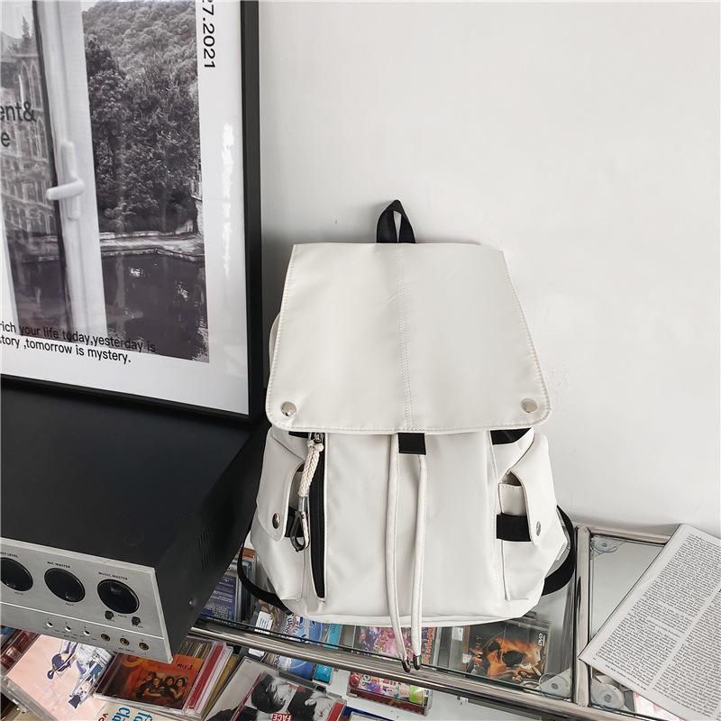 Schoolbag American schoolbag Female college student Pure high school student Campus flip nylon travel Waterproof backpack Boys backpack