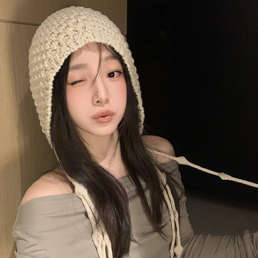 Hand-woven fringed knitted hat women's winter new wool knitted hat hollow ear protector warm Lei Feng hat