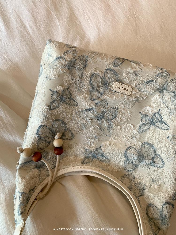 

Weaving Feather Dream Underarm Tote Bag Women s 2024 New Summer Commuter Big Bag Shoulder Bag