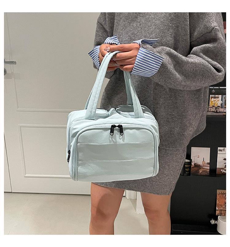 Women's 2025 Multi-Functional Cross-Border Handbag: Large Capacity Fashion Cosmetic & Toiletry Bag with Portable Partition Storage.