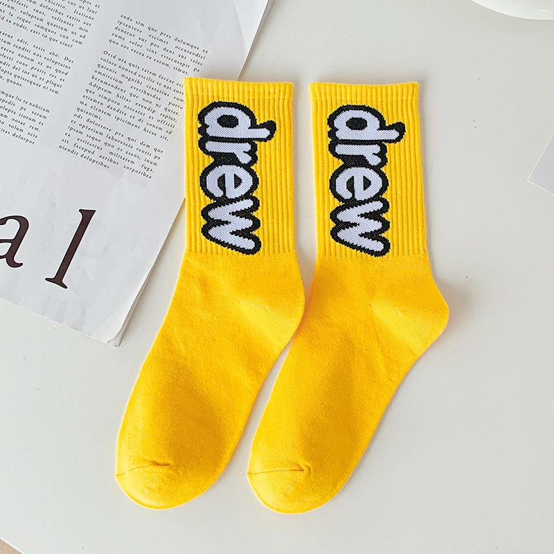 

Женские весенне-осенние трендовые уличные хип-хоп спортивные носки конфетных цветов с разными буквами в тубе из хлопка 1 pair жёлтый