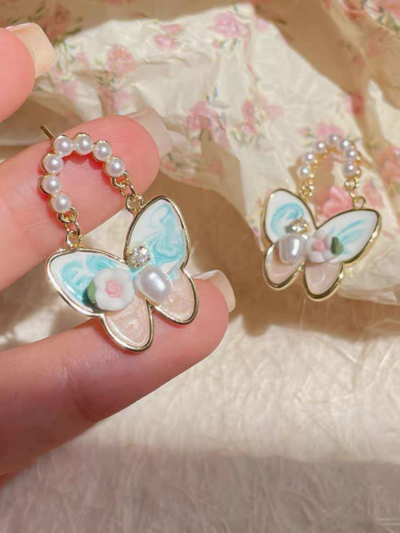 Retro gentle oil painting smudge three-dimensional butterfly pearl flower earrings female niche temperament personalized versatile ear jewelry