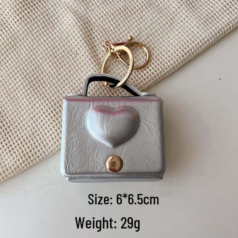 Fashion Mini Bag Keychain: Charm Pendant, Backpack, Handbag, Coin Purse, and Earphone Storage.