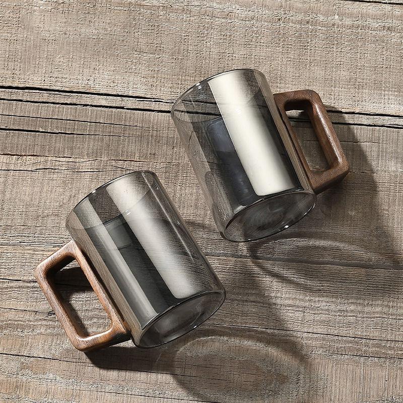 Thickened high temperature resistant glass tea cup Household Japanese transparent green tea cup Office anti-scalding wood handle cup