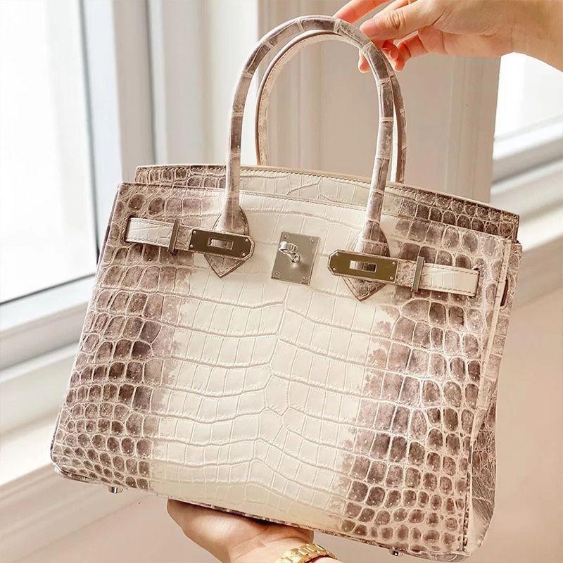 La borsa da donna Yijinyuan ha solo trent'anni. Stessa Borsa. Borsa a Mano in Vera Pelle con Fantasia Coccodrillo a Gradiente Platino 2021. Pendolare.