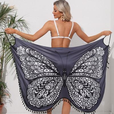 Vestito da donna con bretelle e schiena scoperta per la spiaggia