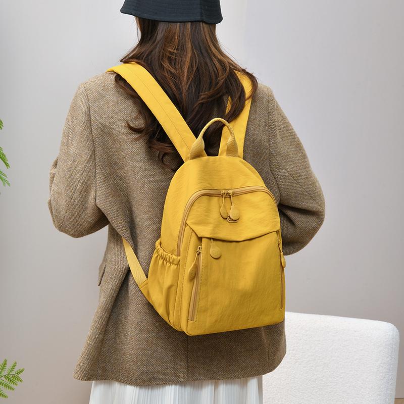 Compact Lightweight Backpack with Multiple Pockets and Front Flap Design for Daily Use and Travel